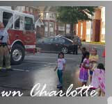 fire engine sprinkling children