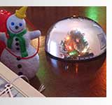 Cmas tree refleceted in glass paperweight